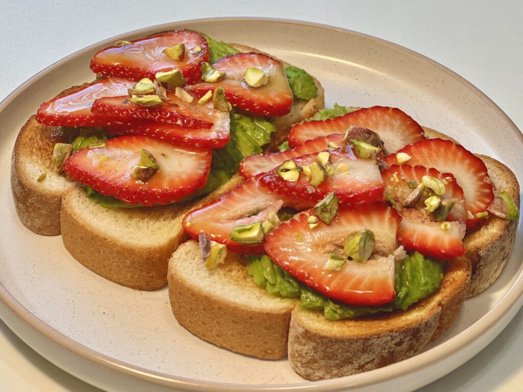 Strawberry Avocado Toast with Pistachios and Maple Syrup